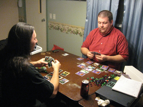 Nathan Stout and Chris McGinty playing NetRunner, that cool CCG during an according to whim photo shoot
